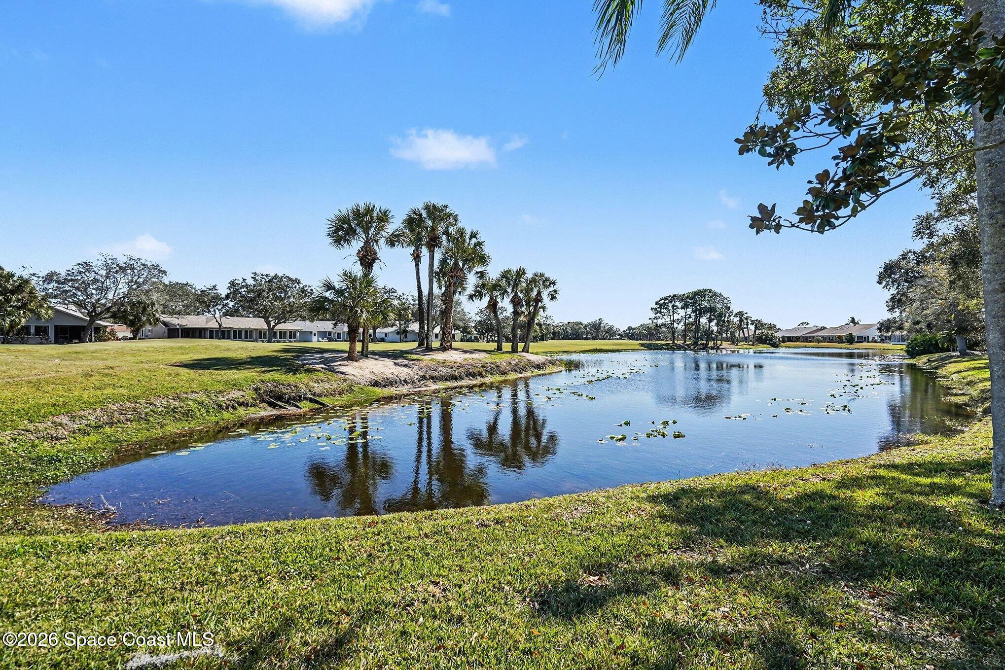 1741 Freedom Drive Melbourne, FL 32940 - Photo 25 of 37 a view of a lake with houses