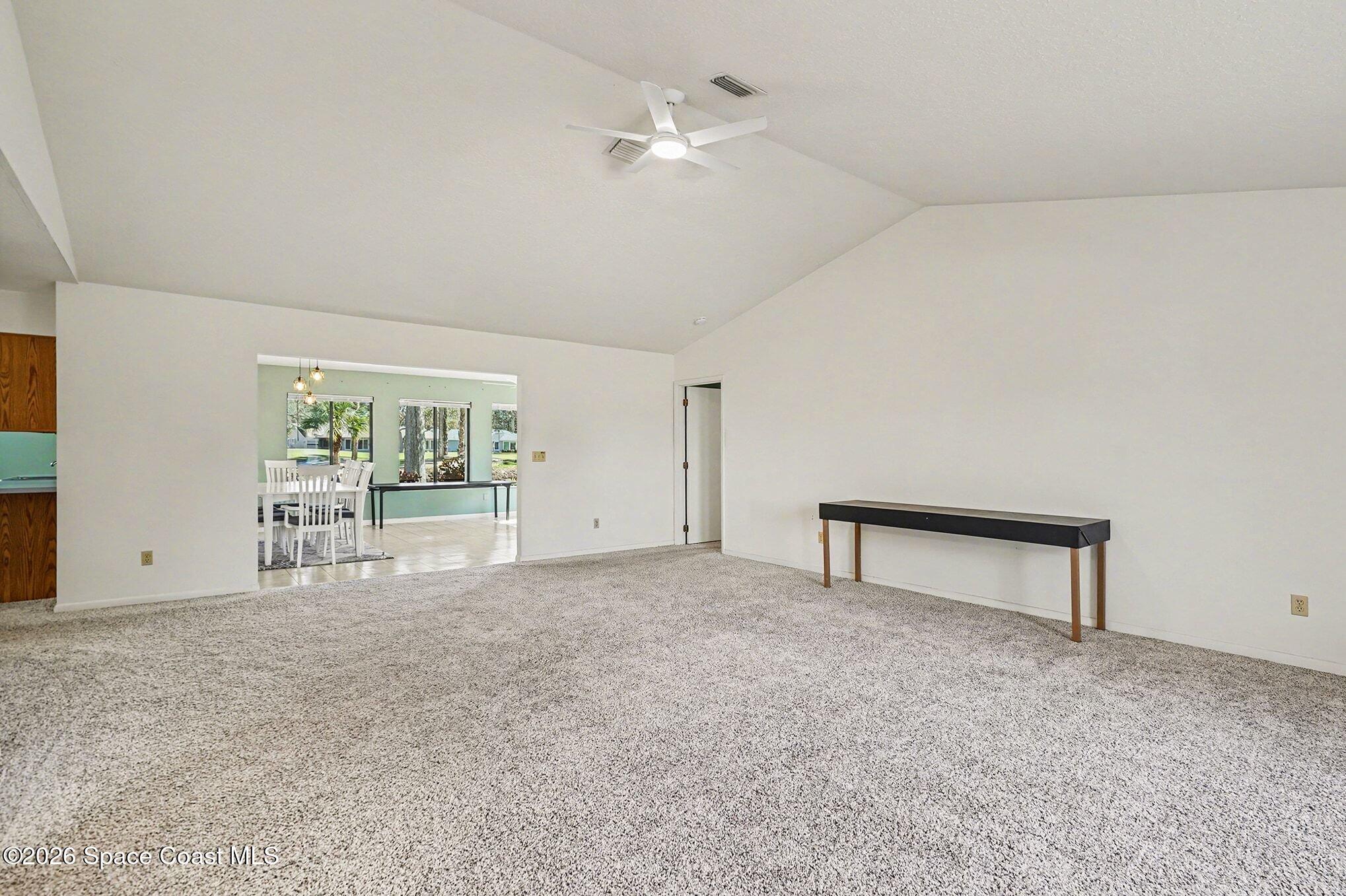 1741 Freedom Drive Melbourne, FL 32940 - Photo 6 of 37 a view of an empty room with a window