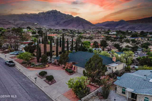 a view of a parking space in front of a building