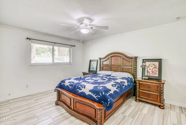 a view of a porch with furniture and garden