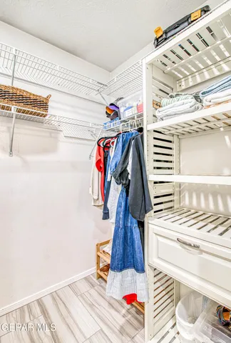 a view of a backyard with sitting area