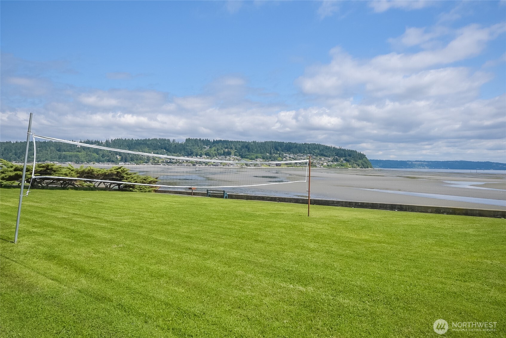 7822 Songbird Way Clinton, WA 98236 - Photo 34 of 38 a view of a lake with houses in the back