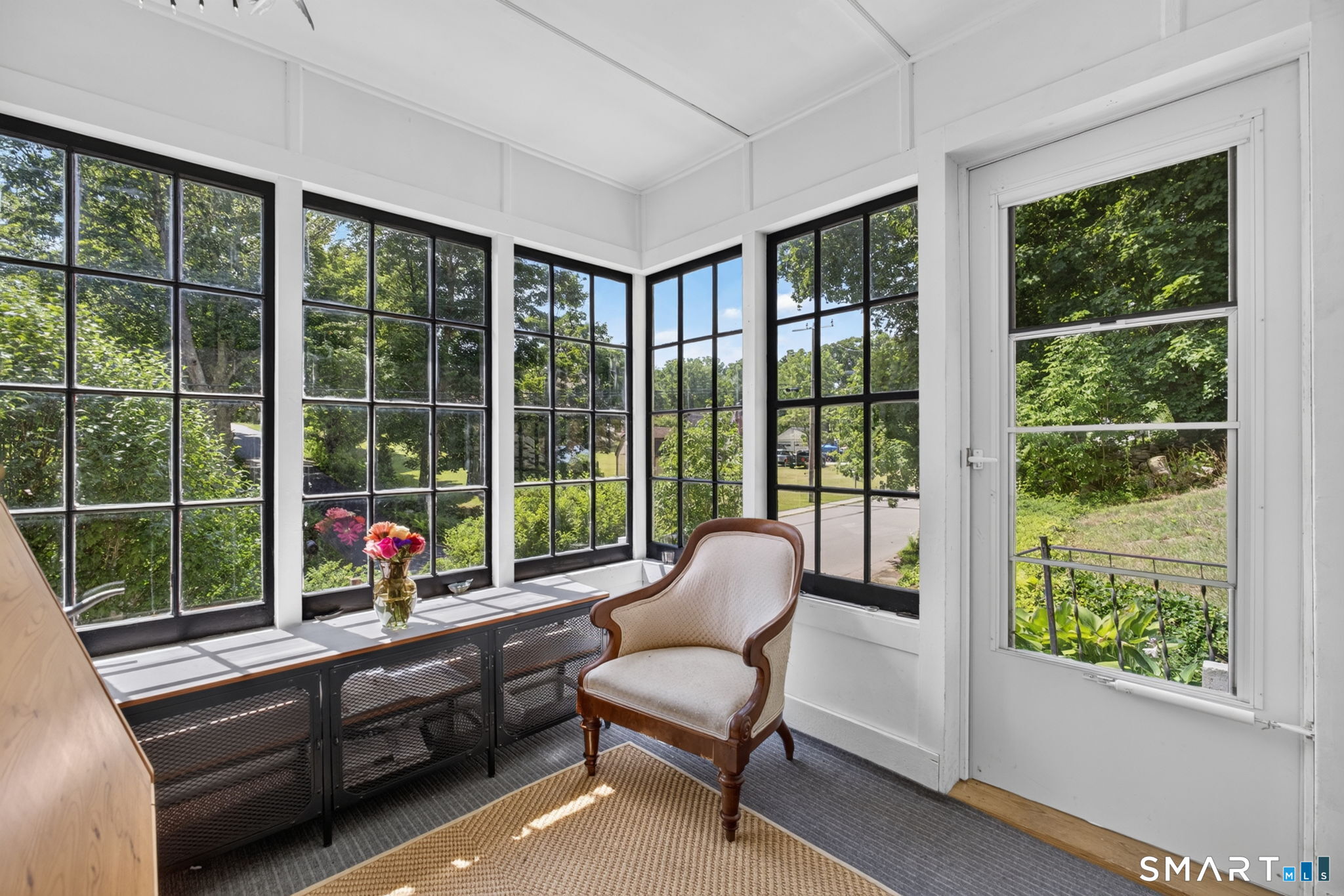 79 River Street Deep River, CT 06417 - Photo 4 of 40 a view of a room that has a bed chair and a large window