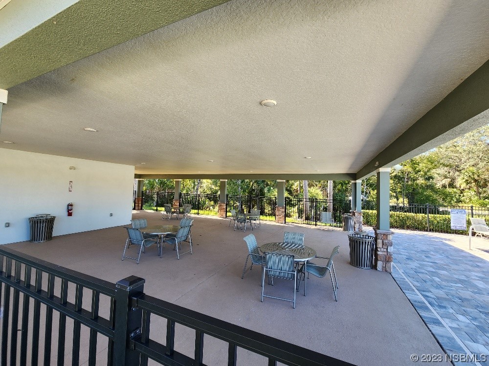 1839 Red Rock Road New Smyrna Beach, FL 32168 - Photo 23 of 23 a view of a dining room with furniture window and outside view