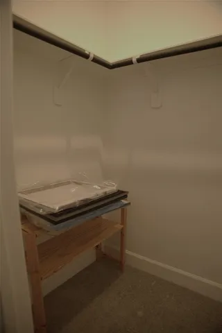 a view of a room with racks on the wall