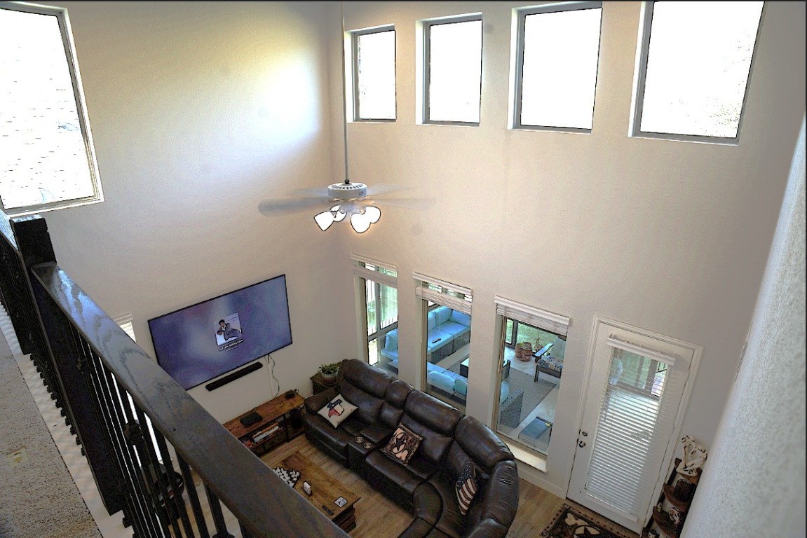 284 Kimble Creek Loop Kyle, TX 78640 - Photo 29 of 32 a view of a workspace with furniture and a window