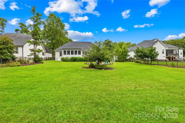 a view of a house with a big yard