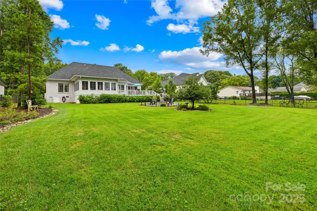 a view of a park with large trees