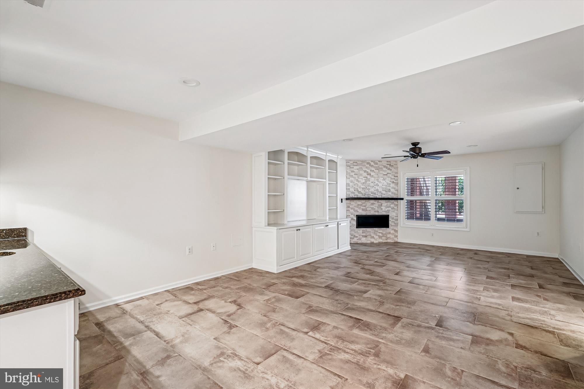 43439 Wild Dunes Square Leesburg, VA 20176 - Photo 18 of 51 Finished basement with gas fireplace