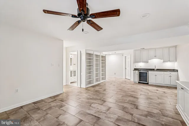 a view of a livingroom with a kitchen