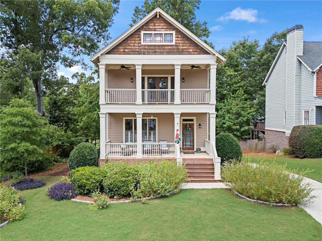1843 Timberwood Trace Decatur, GA 30032 - Photo 1 of 1 a front view of a house with a yard