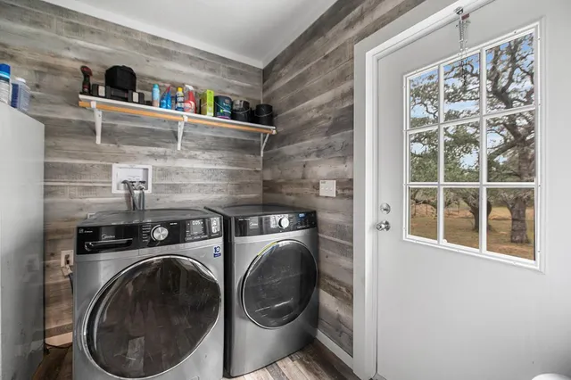 a utility room with dryer and washer