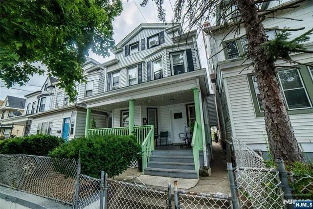 a view of a house with a porch