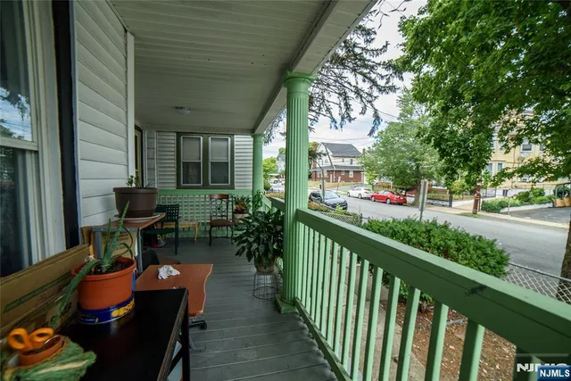 a view of swimming pool with outdoor seating