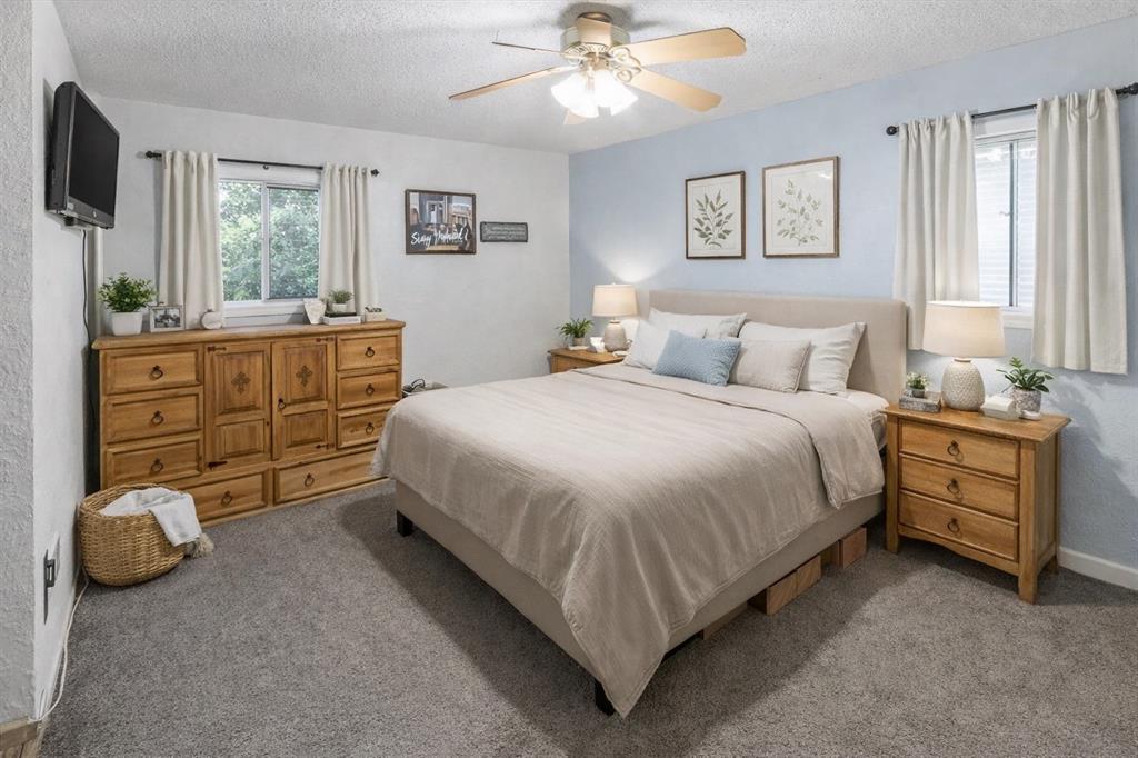 600 South Colorado Street Whitney, TX 76692 - Photo 23 of 26 a bedroom with a bed and a dresser