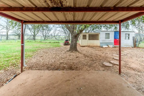 a house with trees in the background