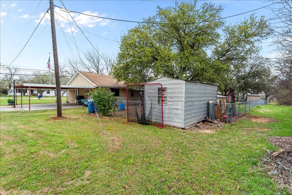 600 South Colorado Street Whitney, TX 76692 - Photo 8 of 26 a view of a house with backyard and sitting area