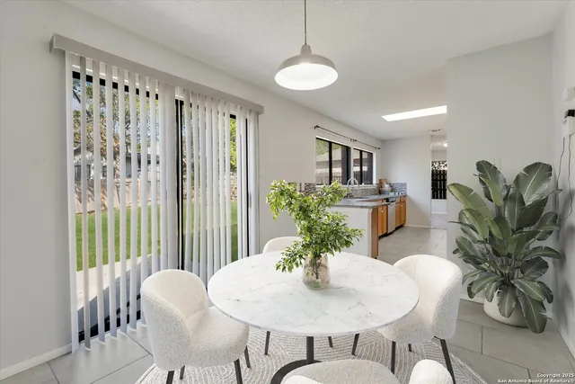 a view of a dining room with furniture