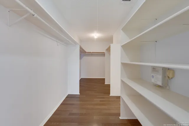 a bathroom with a shower and toilet