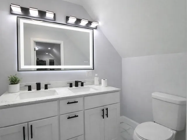 a workspace with furniture and wooden floor