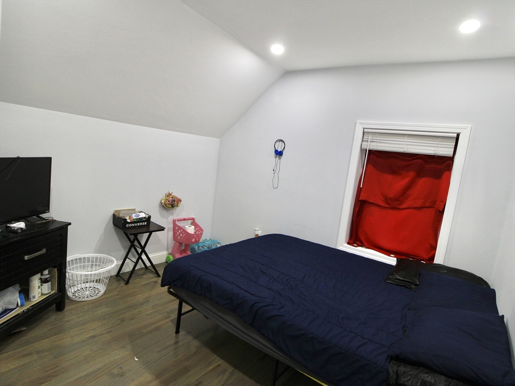 210 Nichols Street Gardner, MA 01440 - Photo 21 of 25 a workspace with furniture and wooden floor