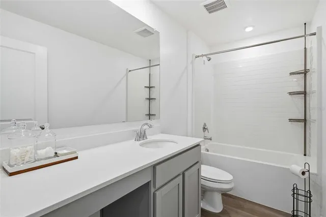 a view of a livingroom with a furniture