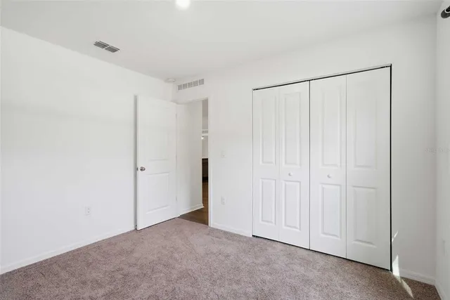 a view of a livingroom with furniture