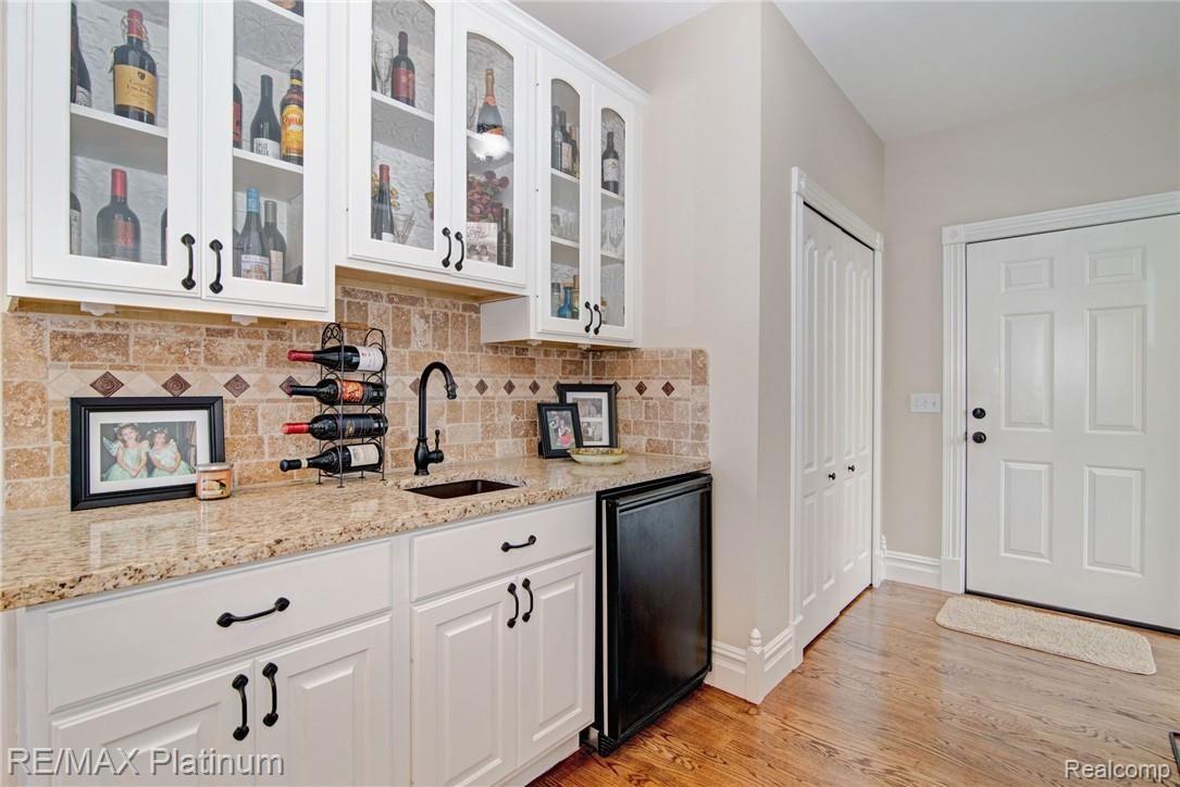 629 Brighton Lake Road Brighton, MI 48116 - Photo 10 of 45 Wet bar for the entertainers or additional snack space for the kids.