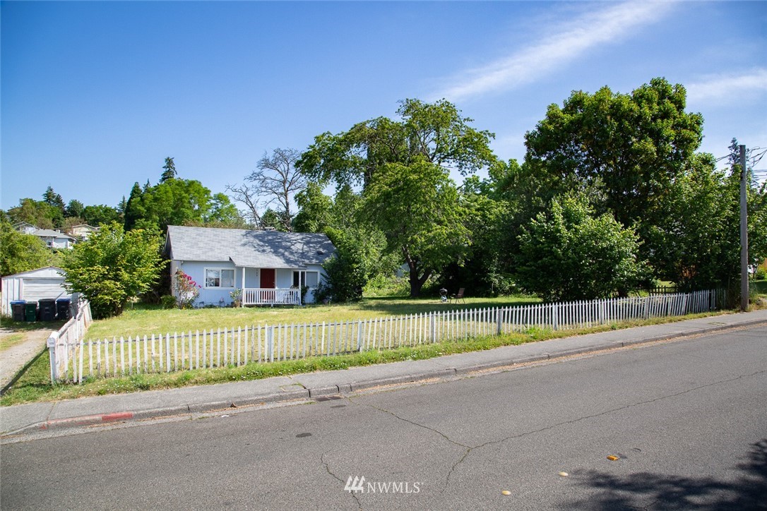 416-500 Sheridan Road Bremerton, WA 98310 - Photo 12 of 13 a view of a house with a street and a small yard