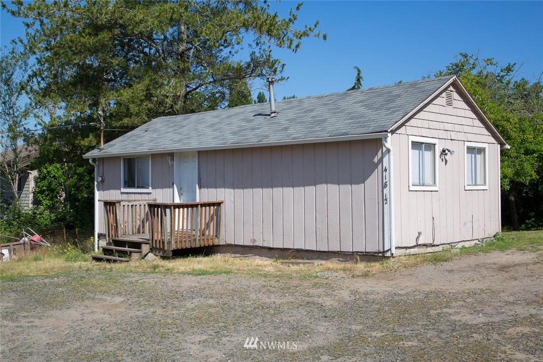 416-500 Sheridan Road Bremerton, WA 98310 - Photo 5 of 13 a view of a small house with wooden fence