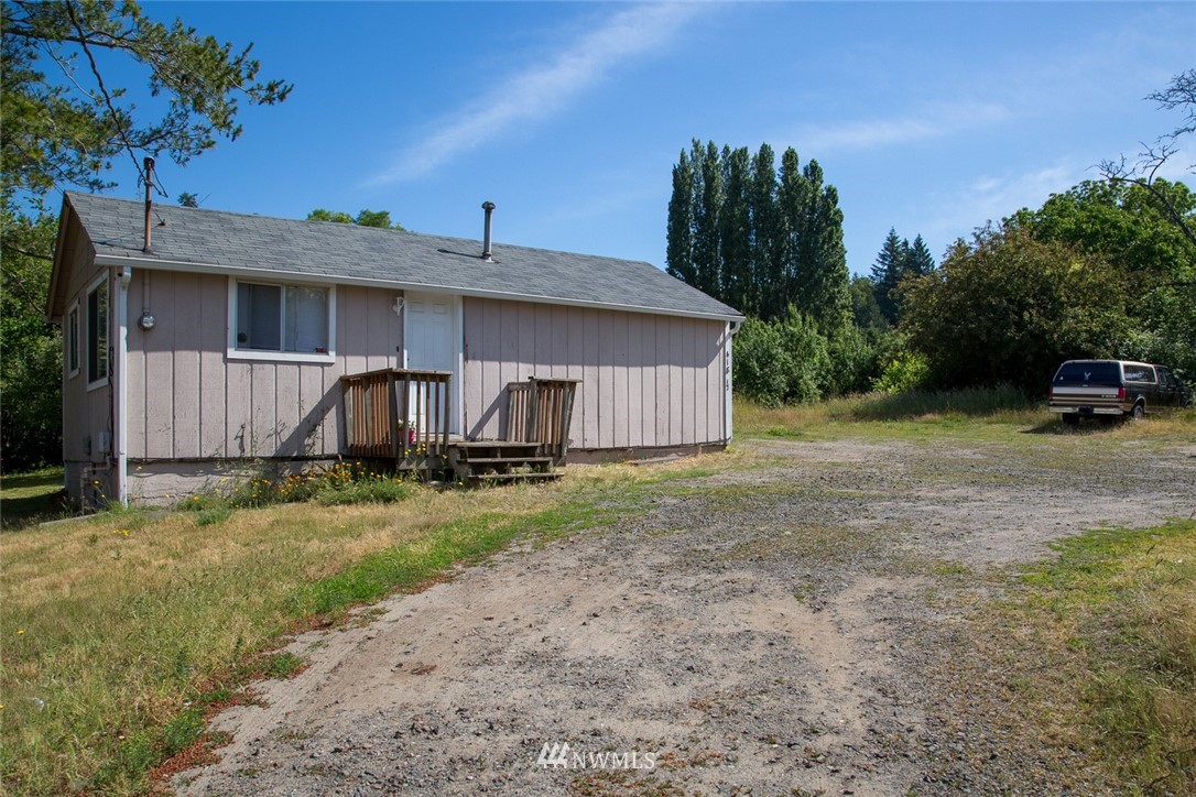 416-500 Sheridan Road Bremerton, WA 98310 - Photo 6 of 13 a view of a house with backyard and trees