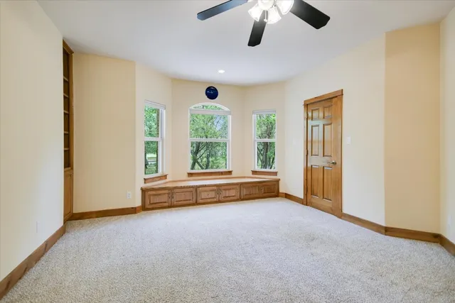 a bathroom with a sink a mirror and a shower
