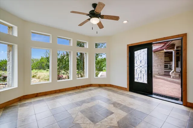 a view of a yard with table and chairs