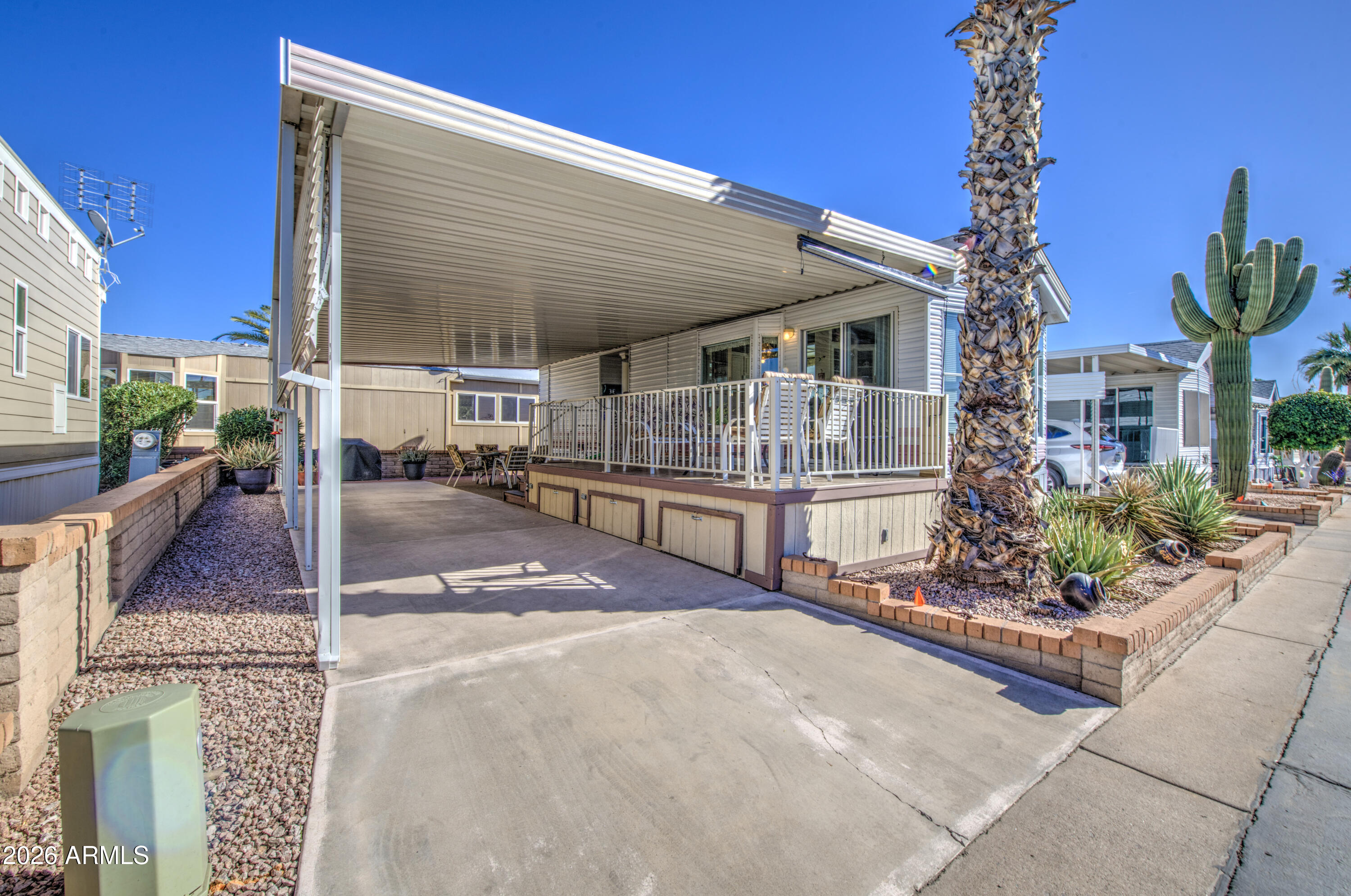 111 South Greenfield Road, Unit 408 Mesa, AZ 85206 - Photo 5 of 22 a view of a house with street
