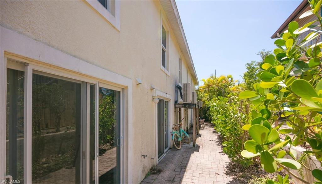 1555 Blue Point Avenue, Unit 3 Naples, FL 34102 - Photo 5 of 9 View of property exterior