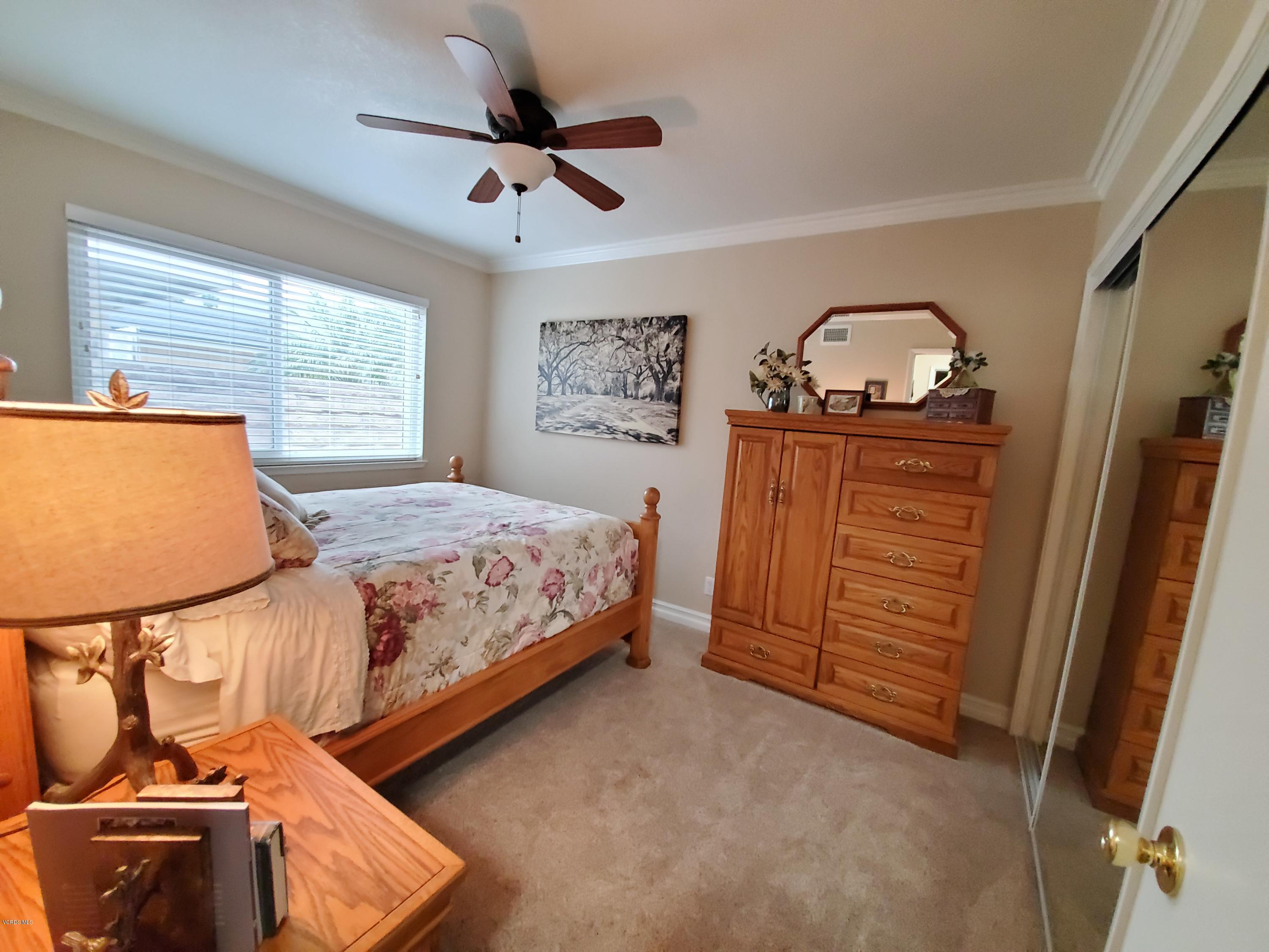 1817 Belhaven Avenue Simi Valley, CA 93063 - Photo 24 of 39 a bedroom with a bed and a dresser