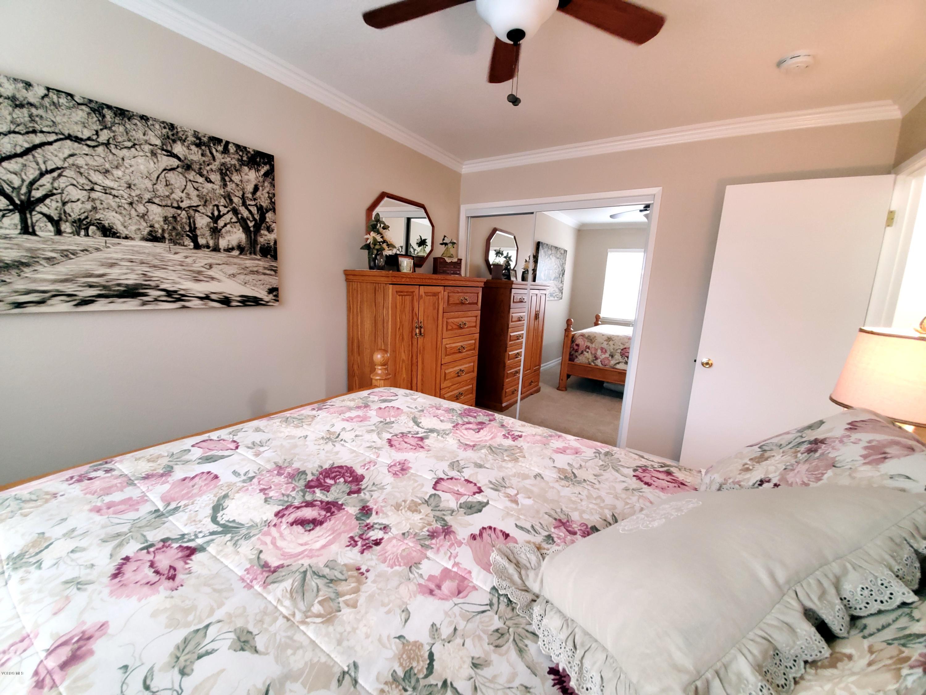 1817 Belhaven Avenue Simi Valley, CA 93063 - Photo 26 of 39 a bedroom with a bed and a dresser