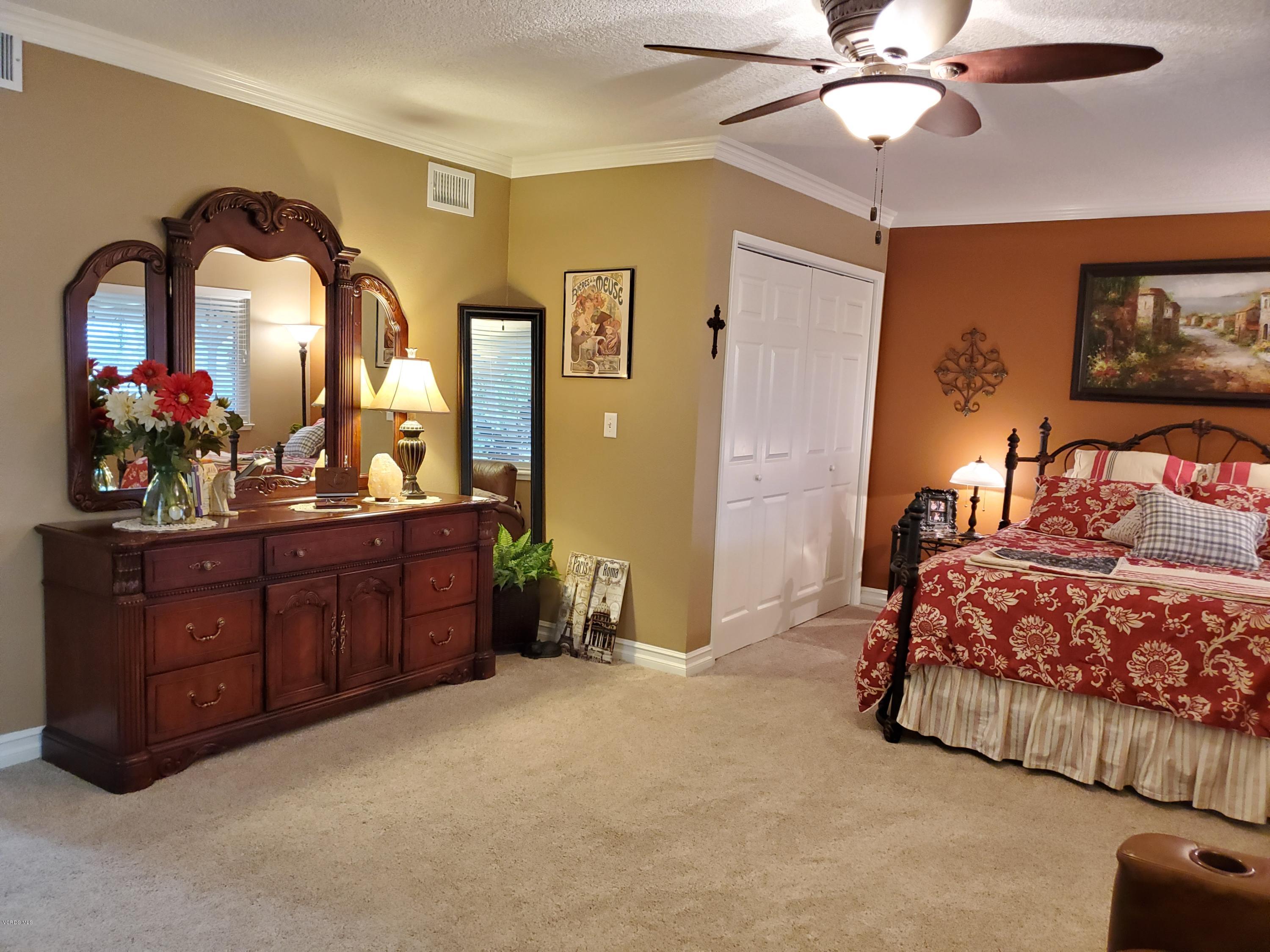 1817 Belhaven Avenue Simi Valley, CA 93063 - Photo 27 of 39 a bedroom with a bed and a dresser