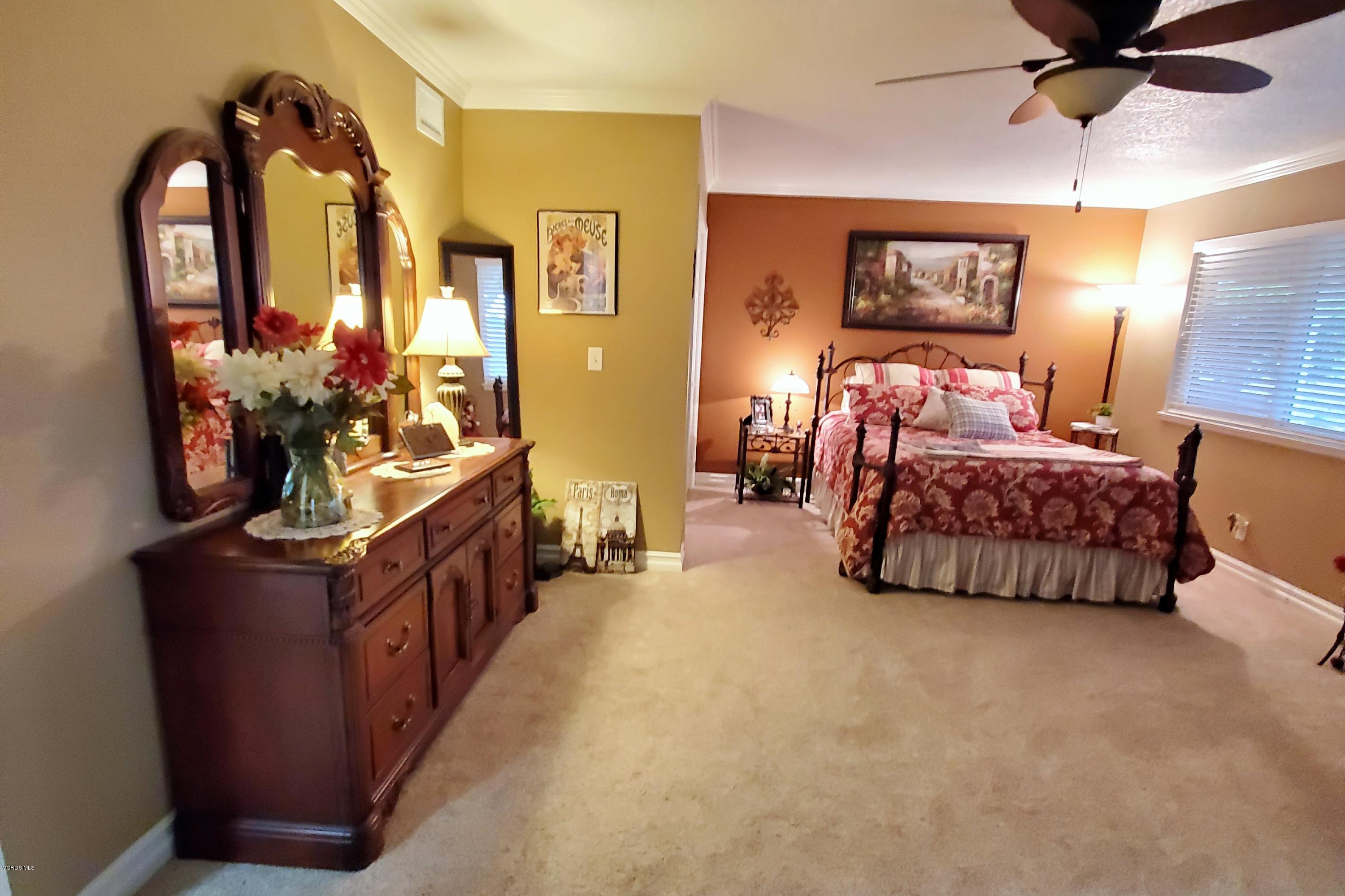 1817 Belhaven Avenue Simi Valley, CA 93063 - Photo 4 of 39 a living room with furniture and a flat screen tv