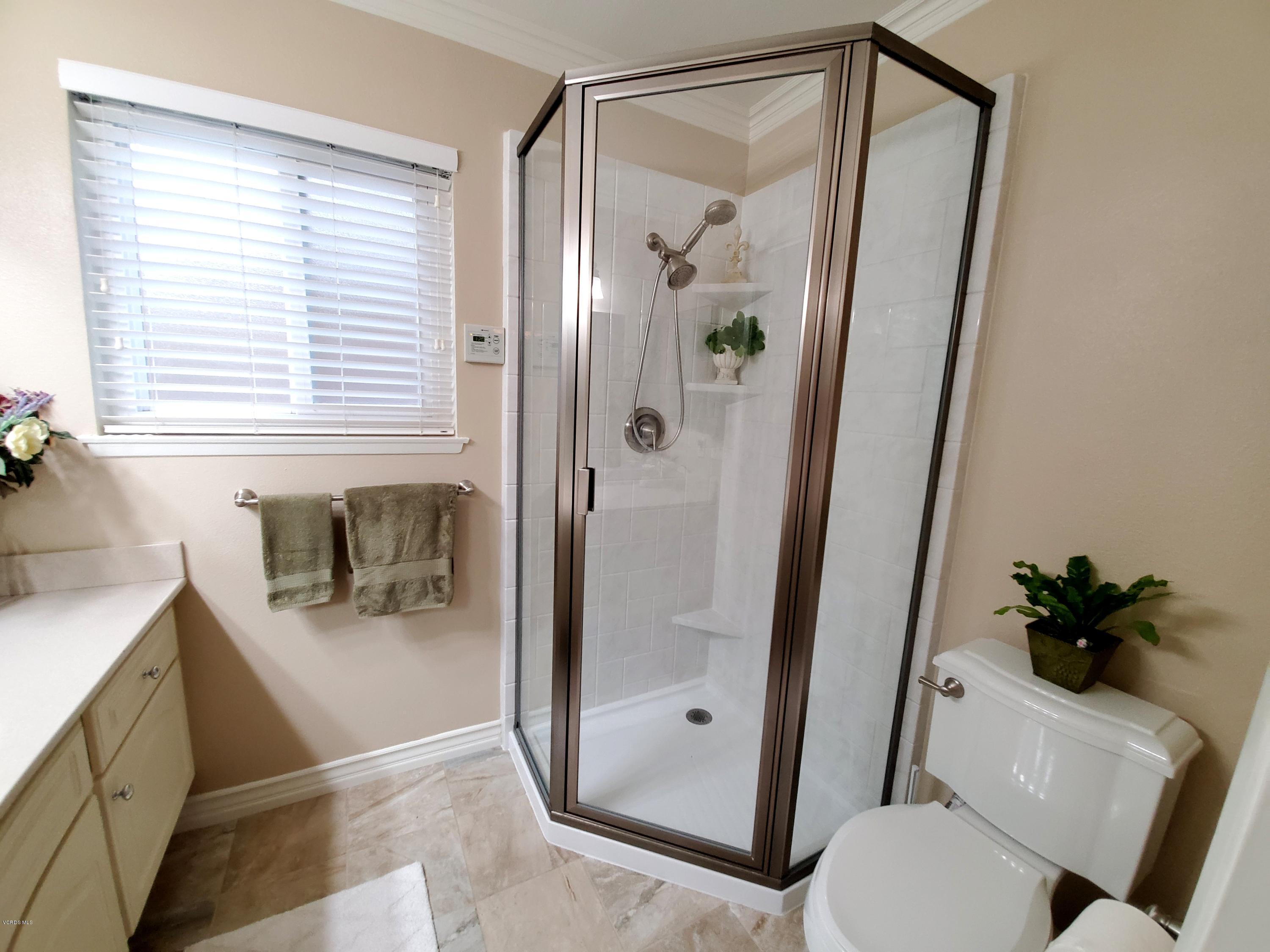 1817 Belhaven Avenue Simi Valley, CA 93063 - Photo 33 of 39 a bathroom with a shower and a toilet