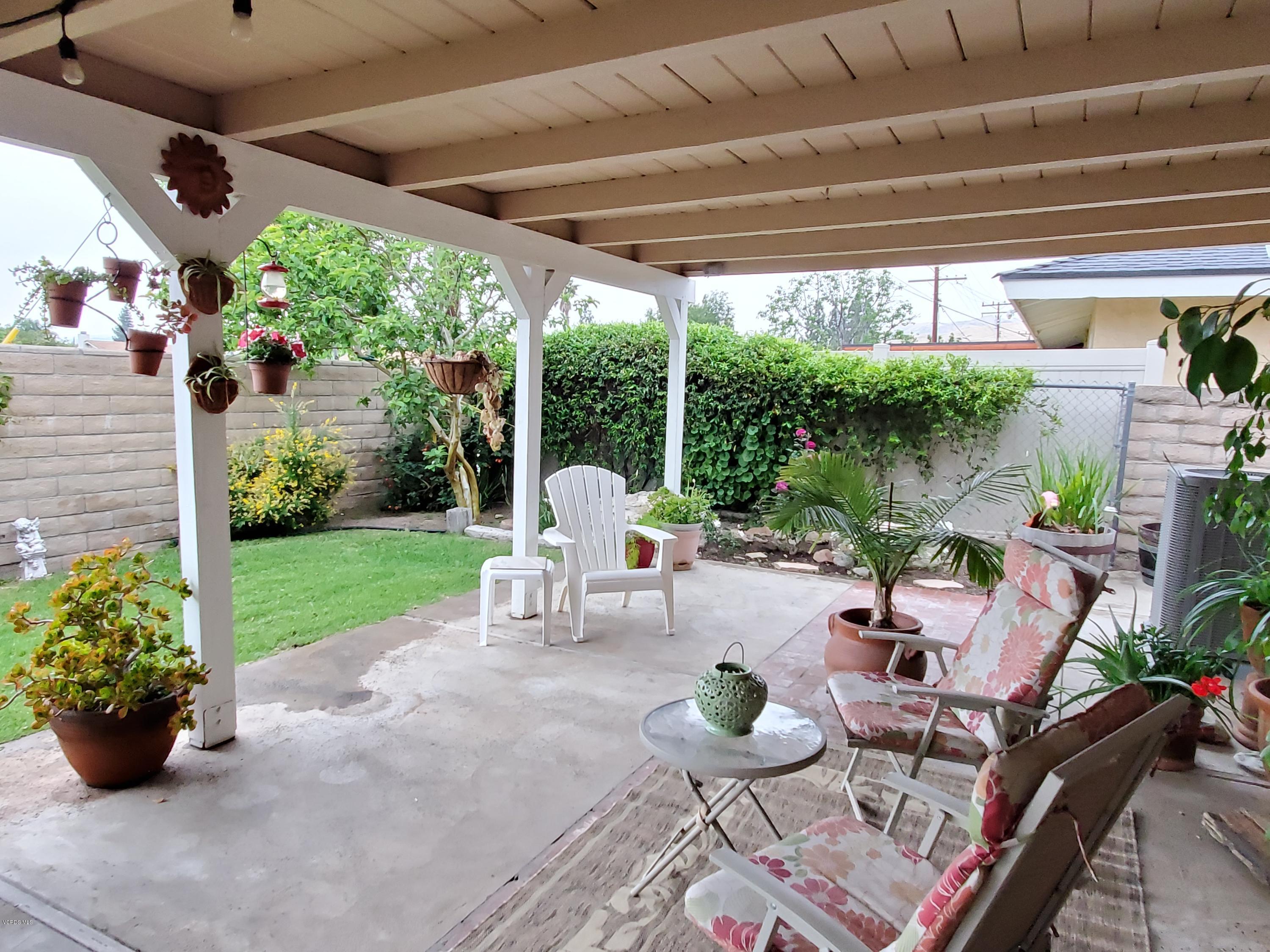 1817 Belhaven Avenue Simi Valley, CA 93063 - Photo 36 of 39 a view of a patio with chairs and a table