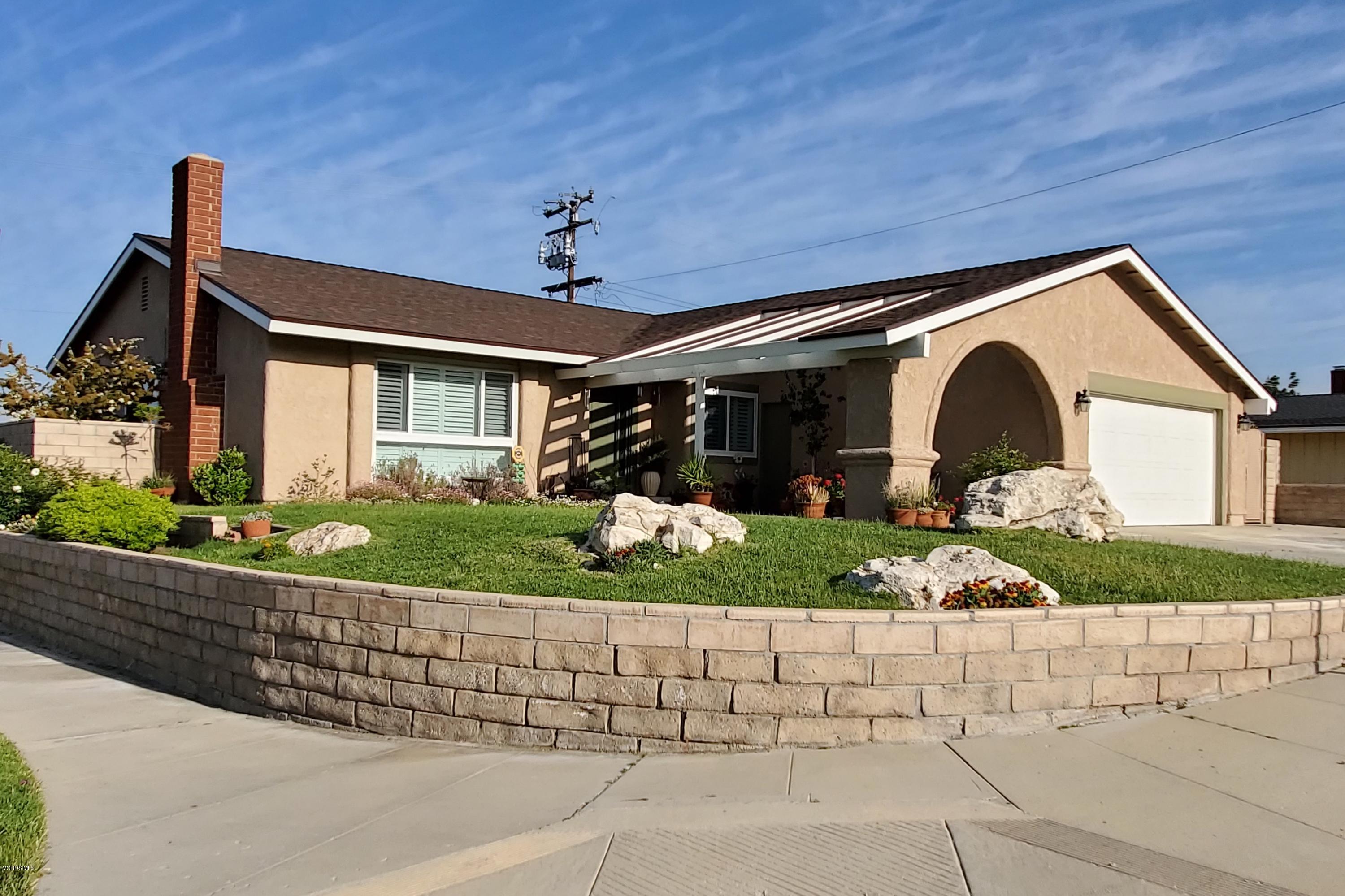 1817 Belhaven Avenue Simi Valley, CA 93063 - Photo 9 of 39 a front view of a house with garden