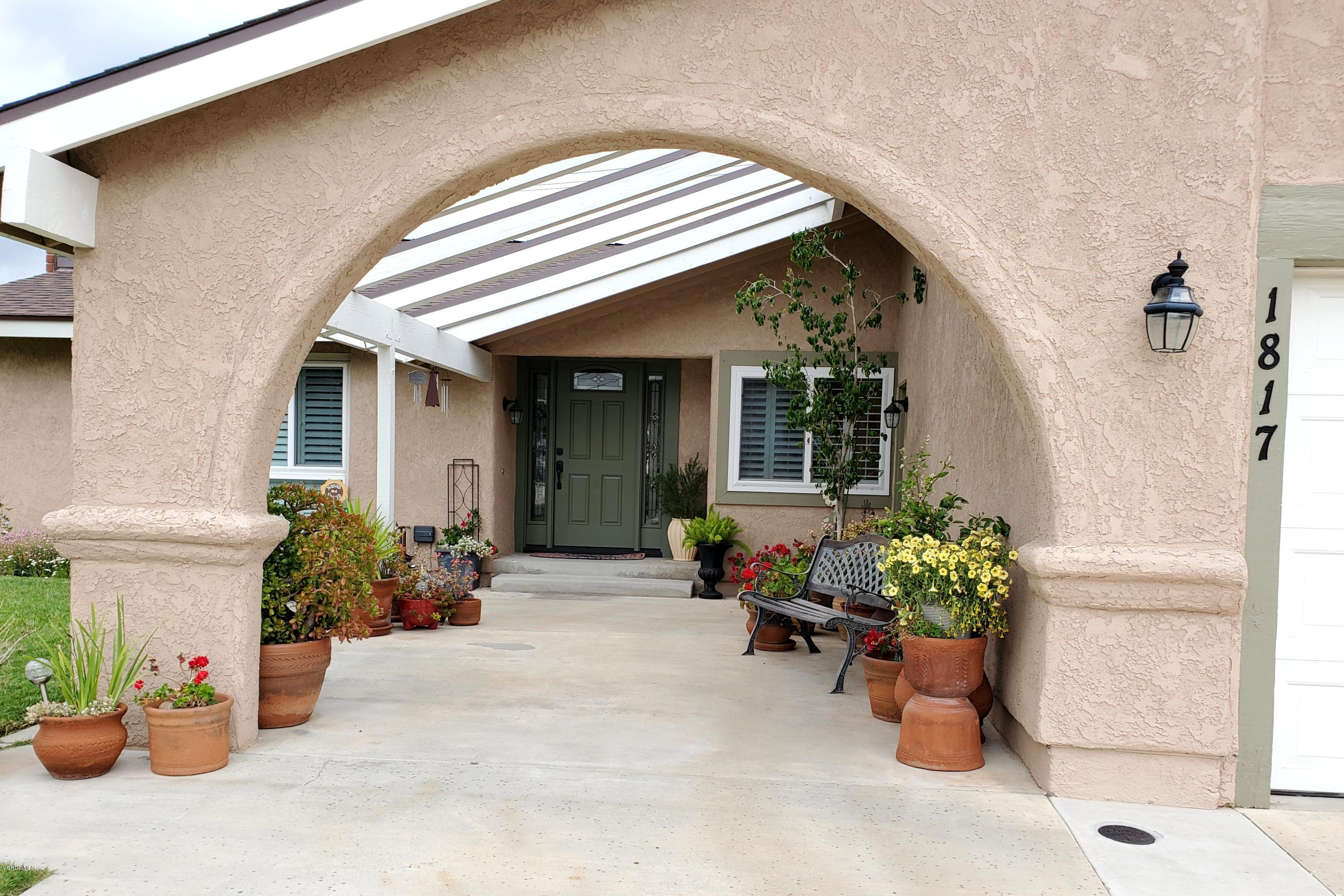 1817 Belhaven Avenue Simi Valley, CA 93063 - Photo 10 of 39 a view of a house with chairs and potted plants
