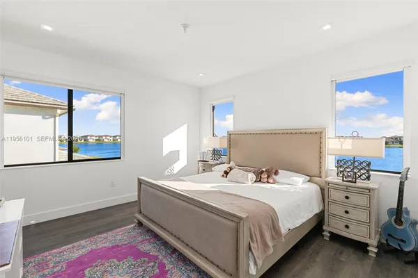 a room with a bed and a window