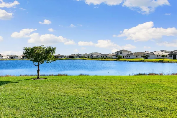 a view of an ocean with houses