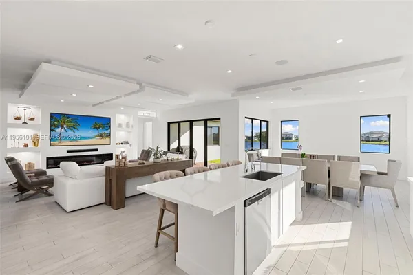 a view of a living room and dining room