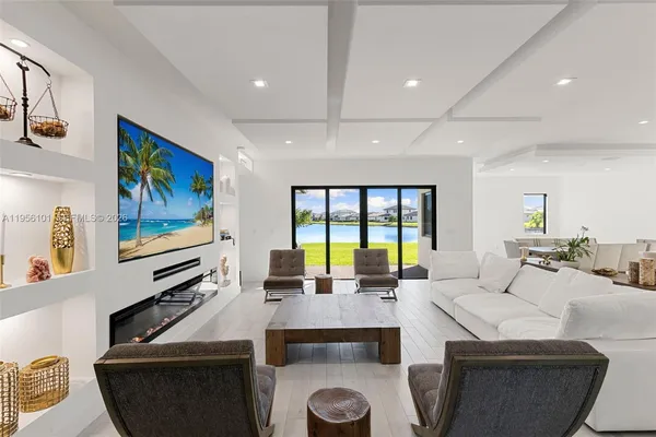 a living room with furniture and window