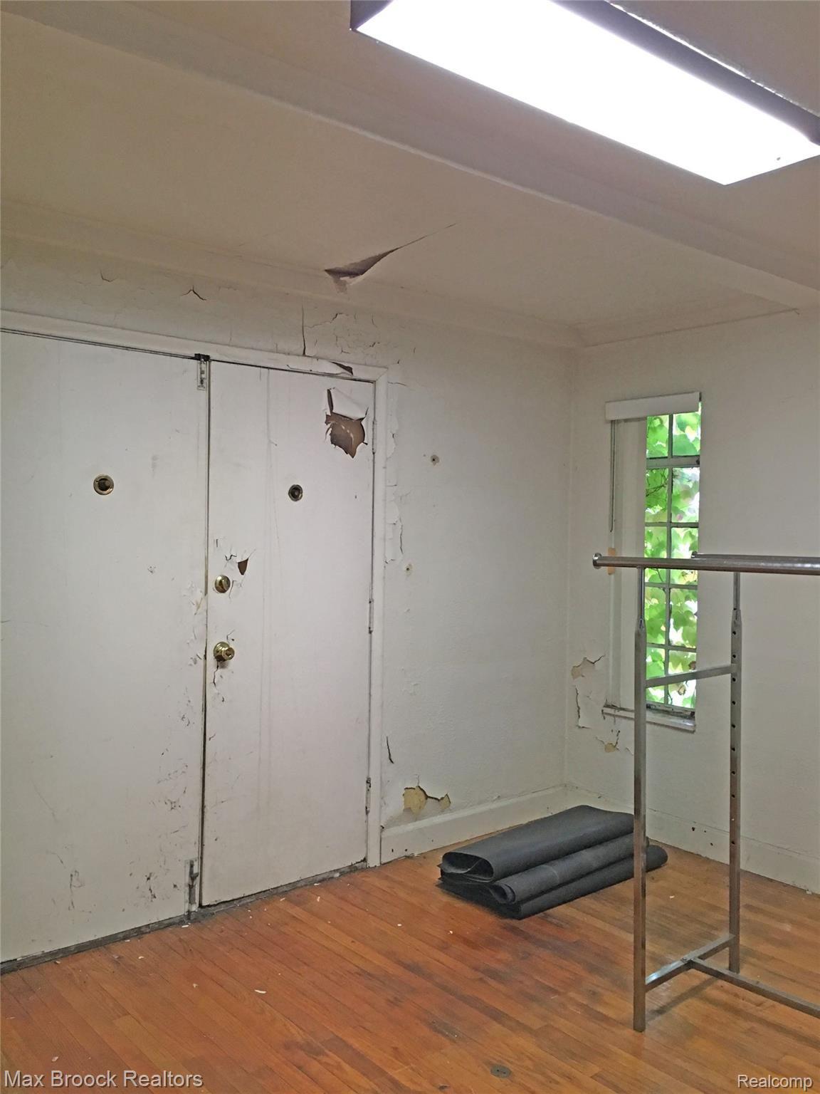 7411 West Seven Mile Road Detroit, MI 48221 - Photo 10 of 32 Dining Room Double Doors to Rear Porch