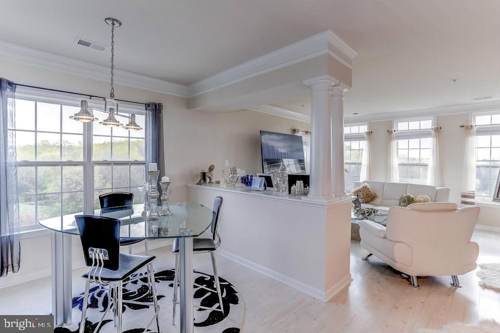1838 B Monocacy View Circle, Unit 55B Frederick, MD 21701 - Photo 12 of 28 a living room with furniture and a large window