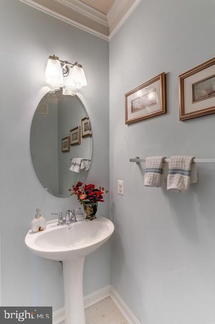 1838 B Monocacy View Circle, Unit 55B Frederick, MD 21701 - Photo 23 of 28 a bathroom with a sink and a mirror